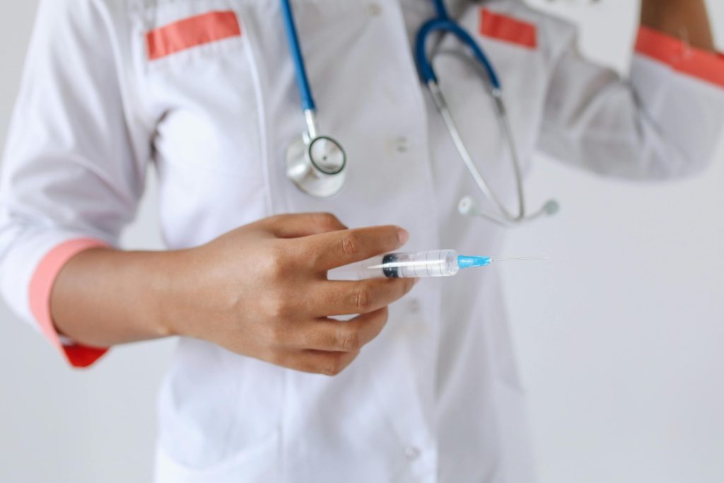 Acasă administrare tratament injectabil intravenos